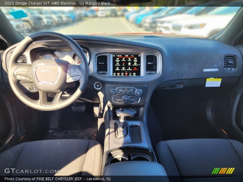 Go Mango / Black 2023 Dodge Charger SXT AWD Blacktop