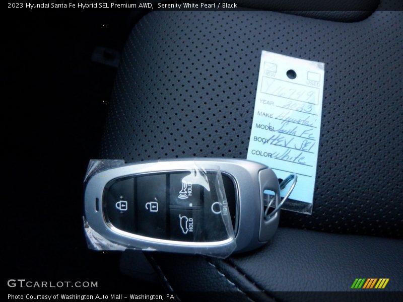 Serenity White Pearl / Black 2023 Hyundai Santa Fe Hybrid SEL Premium AWD