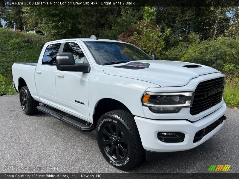 Front 3/4 View of 2024 2500 Laramie Night Edition Crew Cab 4x4