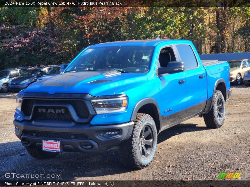Hydro Blue Pearl / Black 2024 Ram 1500 Rebel Crew Cab 4x4