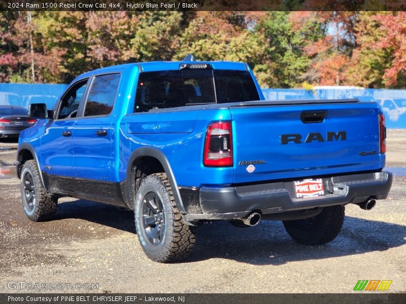 Hydro Blue Pearl / Black 2024 Ram 1500 Rebel Crew Cab 4x4