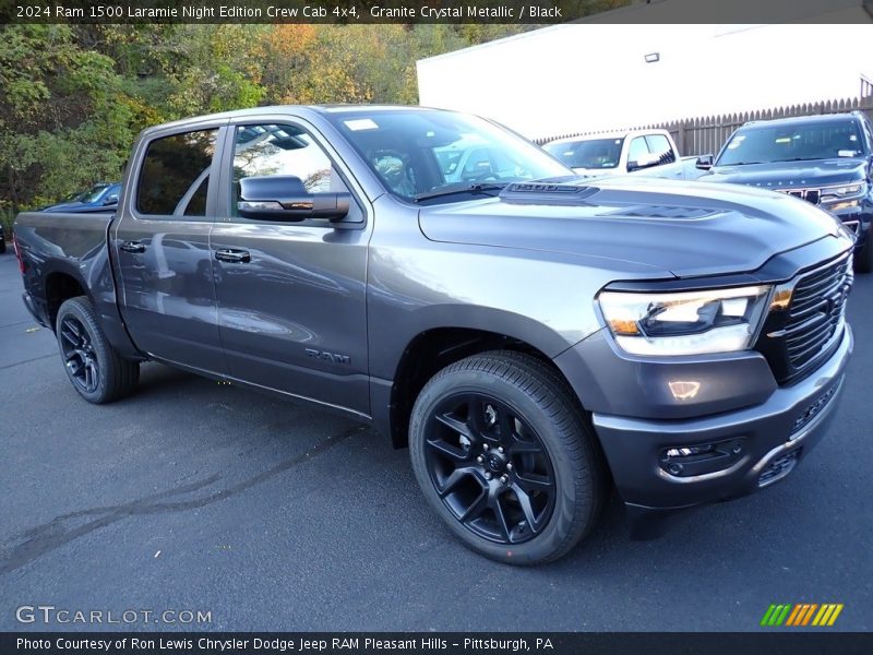Front 3/4 View of 2024 1500 Laramie Night Edition Crew Cab 4x4