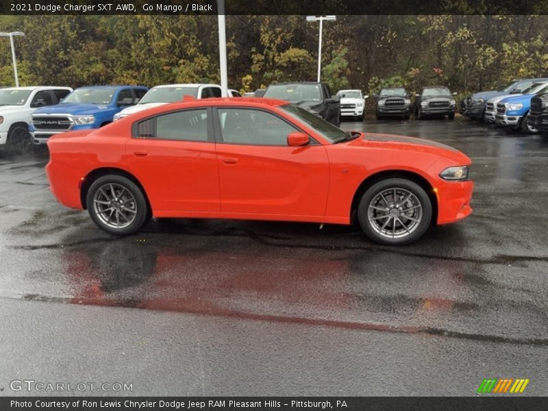 Go Mango / Black 2021 Dodge Charger SXT AWD