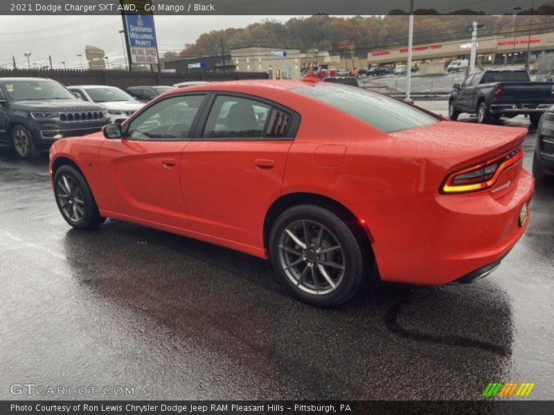 Go Mango / Black 2021 Dodge Charger SXT AWD