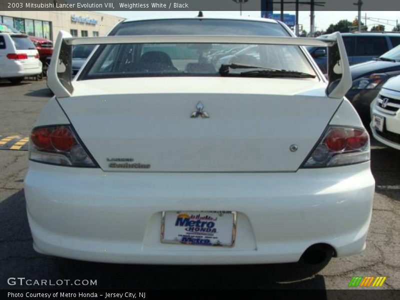 Weightless White / Black 2003 Mitsubishi Lancer Evolution VIII