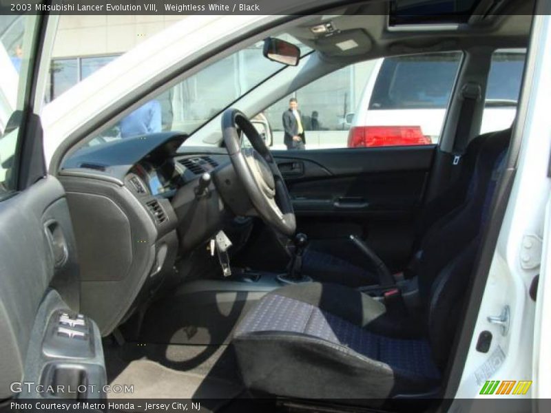 Weightless White / Black 2003 Mitsubishi Lancer Evolution VIII
