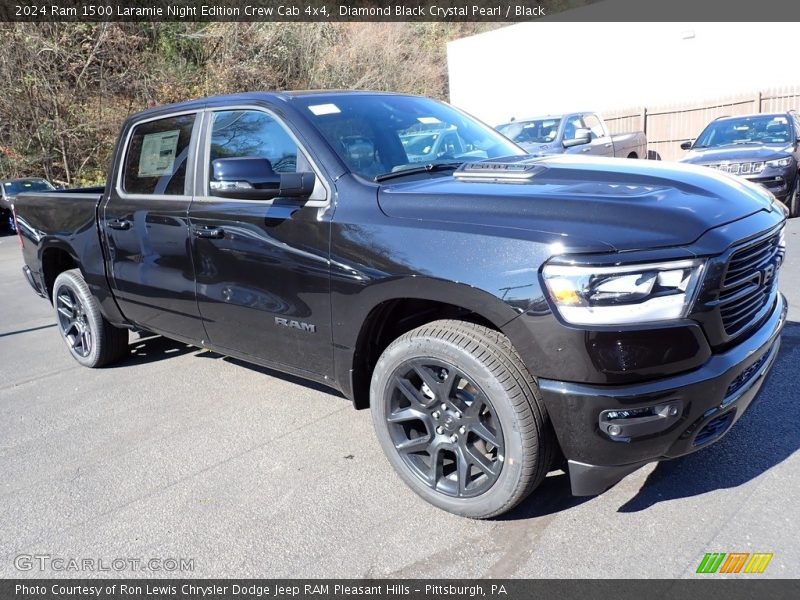 Front 3/4 View of 2024 1500 Laramie Night Edition Crew Cab 4x4