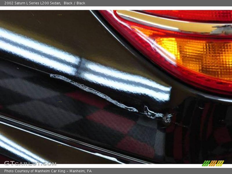 Black / Black 2002 Saturn L Series L200 Sedan