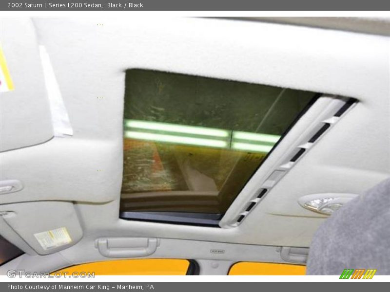 Black / Black 2002 Saturn L Series L200 Sedan