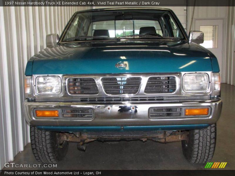 Vivid Teal Pearl Metallic / Dark Gray 1997 Nissan Hardbody Truck XE Extended Cab 4x4