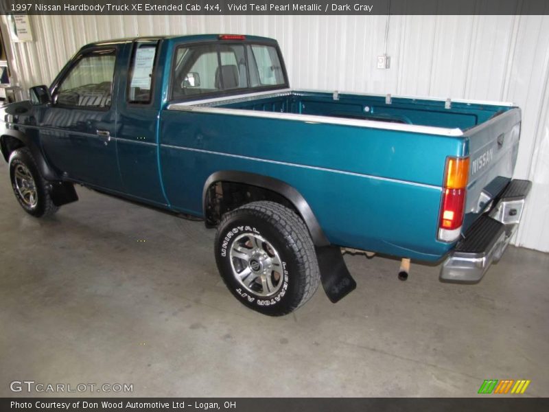 Vivid Teal Pearl Metallic / Dark Gray 1997 Nissan Hardbody Truck XE Extended Cab 4x4