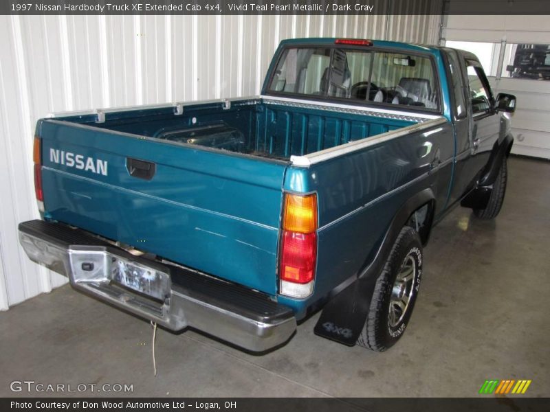 Vivid Teal Pearl Metallic / Dark Gray 1997 Nissan Hardbody Truck XE Extended Cab 4x4