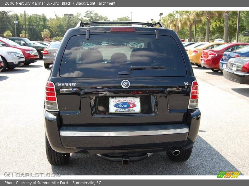 Black / Black/Light Parchment 2006 Mercury Mariner Luxury