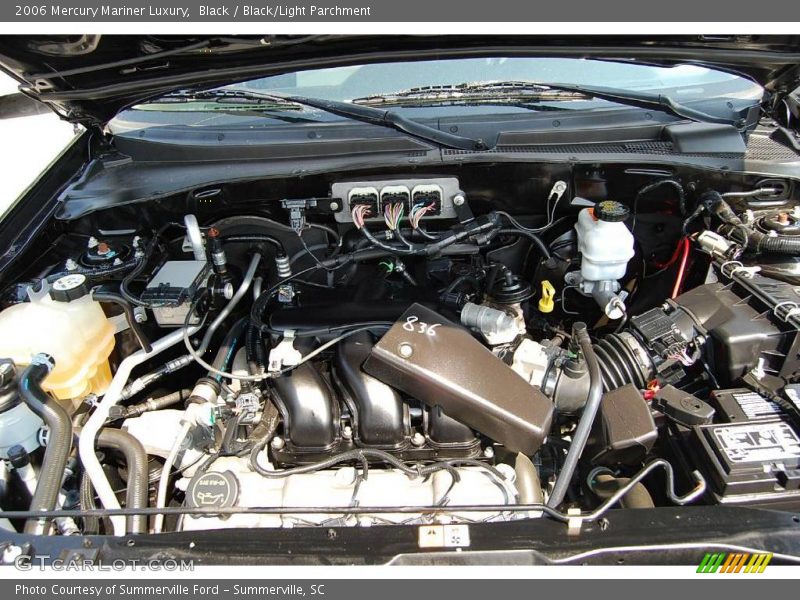 Black / Black/Light Parchment 2006 Mercury Mariner Luxury