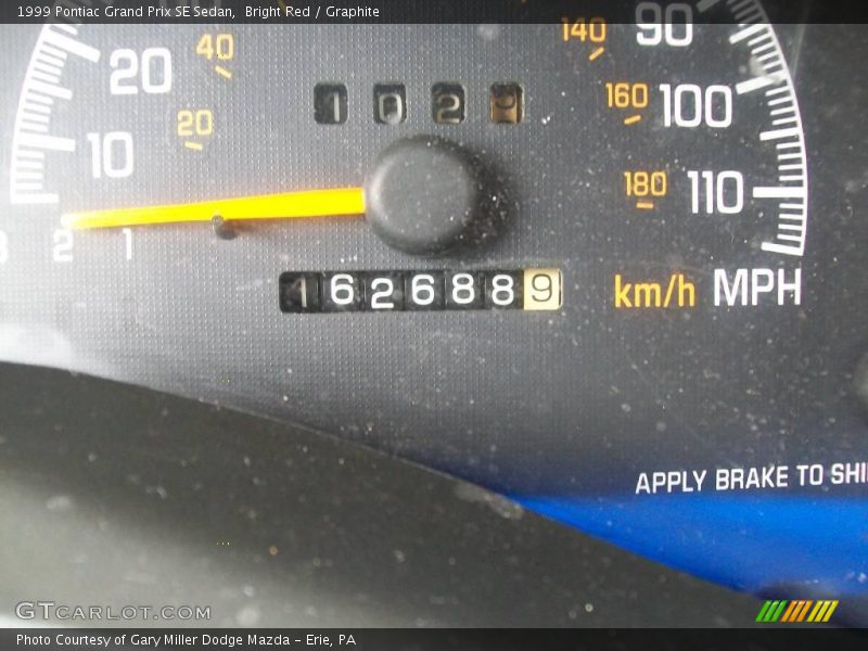 Bright Red / Graphite 1999 Pontiac Grand Prix SE Sedan