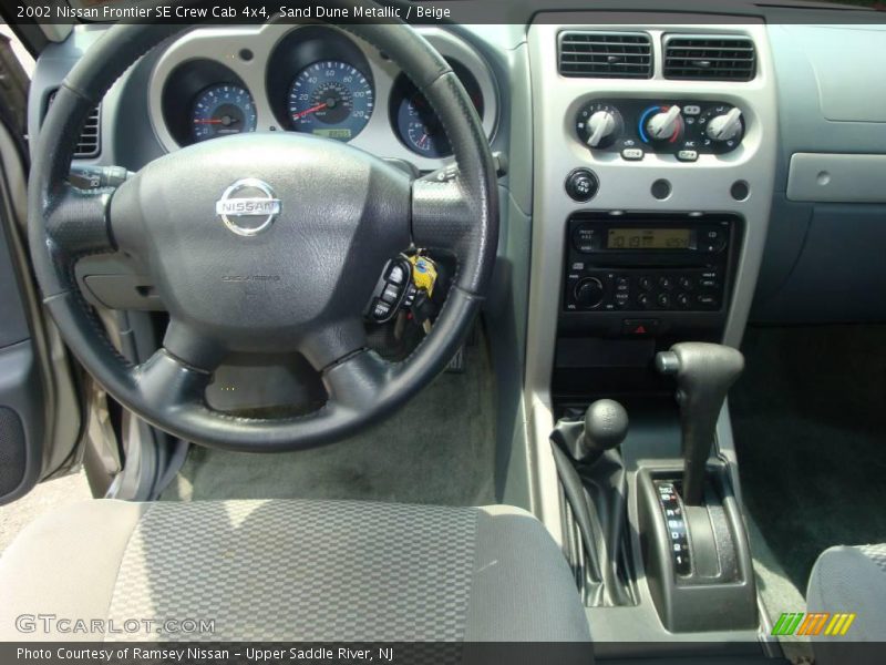 Sand Dune Metallic / Beige 2002 Nissan Frontier SE Crew Cab 4x4