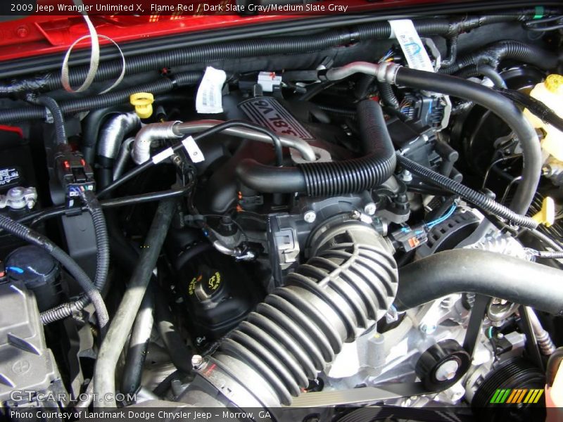 Flame Red / Dark Slate Gray/Medium Slate Gray 2009 Jeep Wrangler Unlimited X