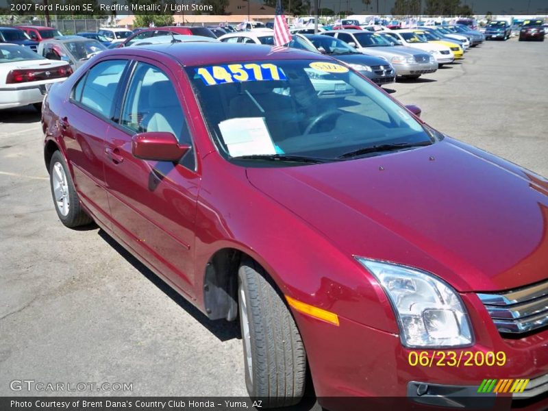 Redfire Metallic / Light Stone 2007 Ford Fusion SE