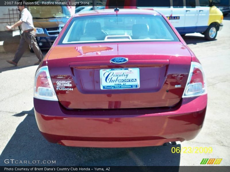 Redfire Metallic / Light Stone 2007 Ford Fusion SE
