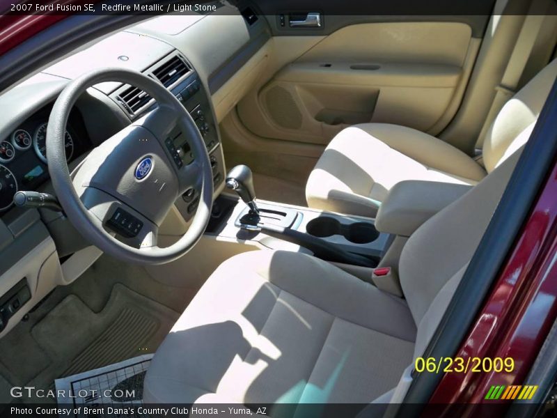 Redfire Metallic / Light Stone 2007 Ford Fusion SE