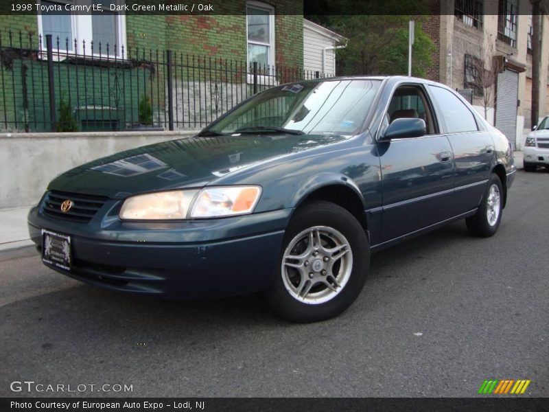 Dark Green Metallic / Oak 1998 Toyota Camry LE
