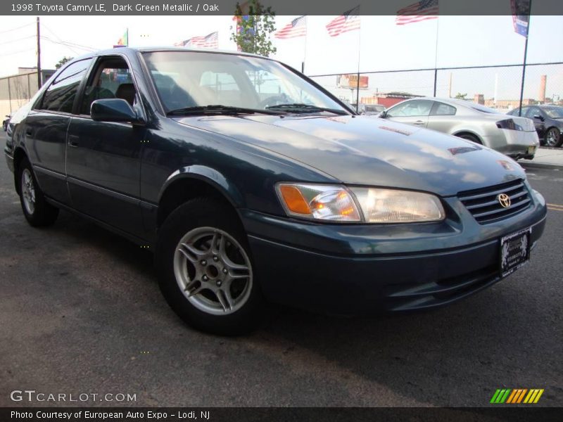 Dark Green Metallic / Oak 1998 Toyota Camry LE