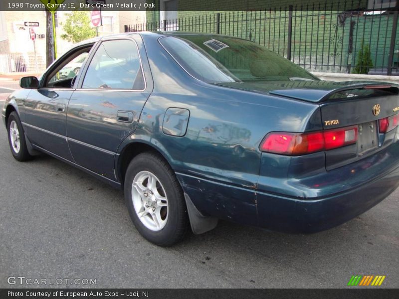 Dark Green Metallic / Oak 1998 Toyota Camry LE