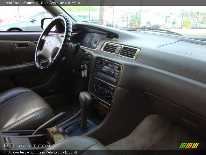 Dark Green Metallic / Oak 1998 Toyota Camry LE