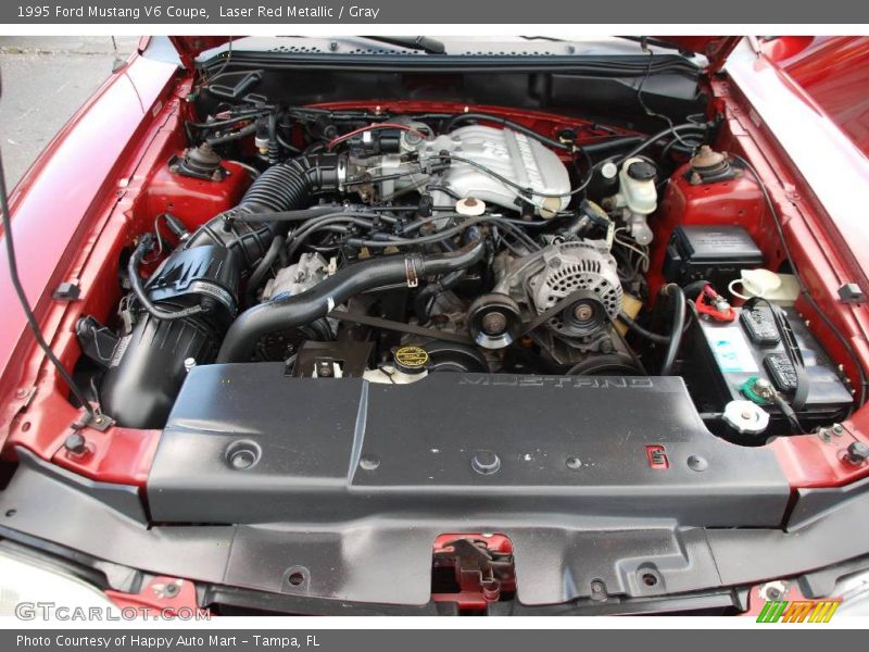 Laser Red Metallic / Gray 1995 Ford Mustang V6 Coupe