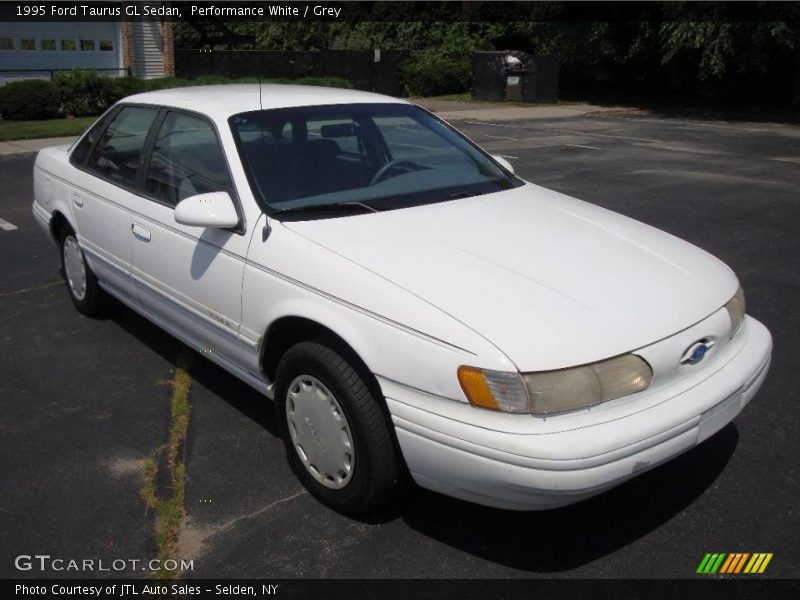 Performance White / Grey 1995 Ford Taurus GL Sedan