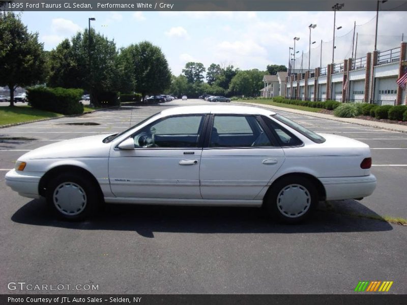 Performance White / Grey 1995 Ford Taurus GL Sedan