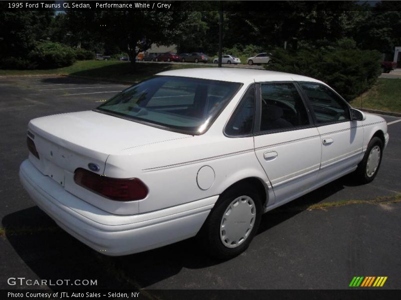 Performance White / Grey 1995 Ford Taurus GL Sedan