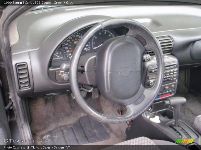 Green / Gray 1999 Saturn S Series SC2 Coupe
