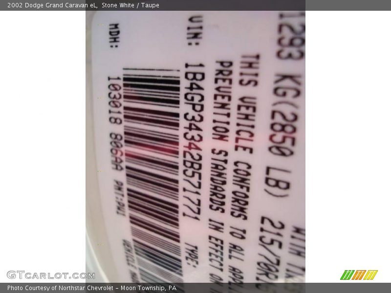 Stone White / Taupe 2002 Dodge Grand Caravan eL