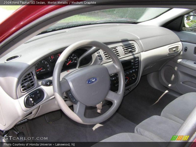 Merlot Metallic / Medium Graphite 2004 Ford Taurus SES Sedan