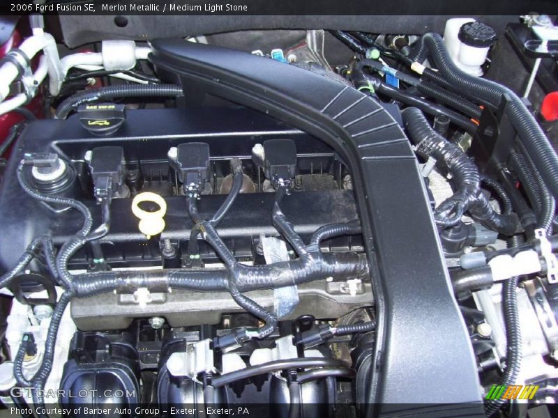 Merlot Metallic / Medium Light Stone 2006 Ford Fusion SE