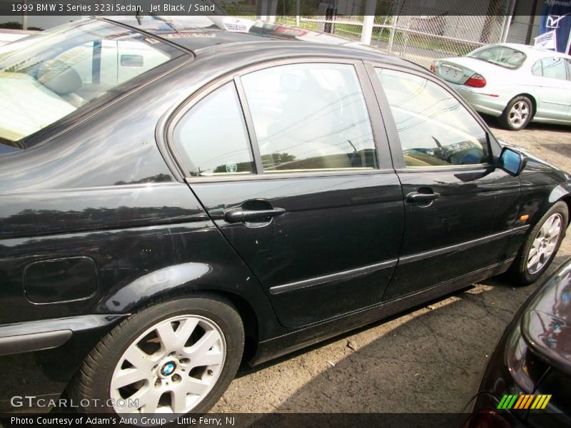 Jet Black / Sand 1999 BMW 3 Series 323i Sedan