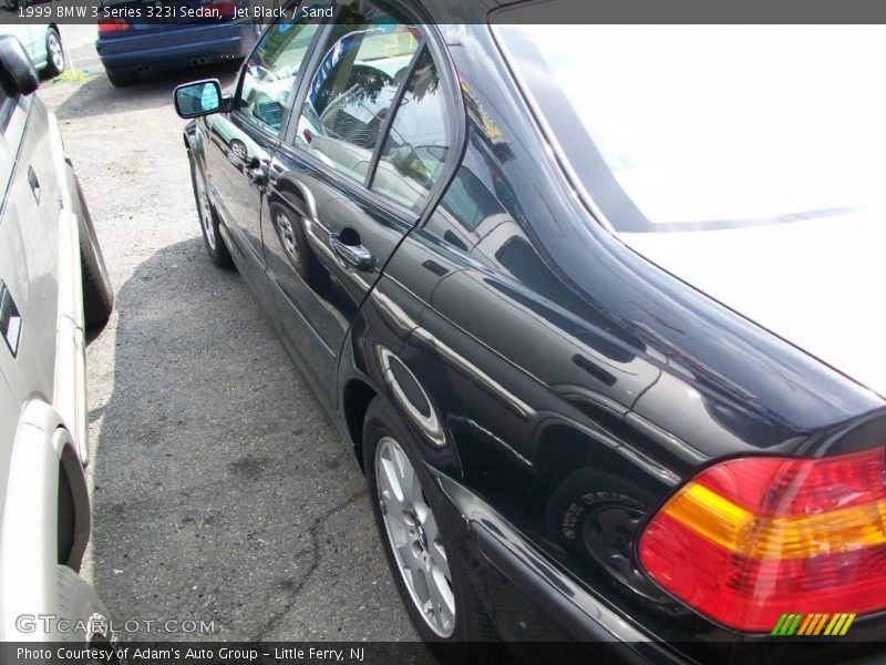 Jet Black / Sand 1999 BMW 3 Series 323i Sedan