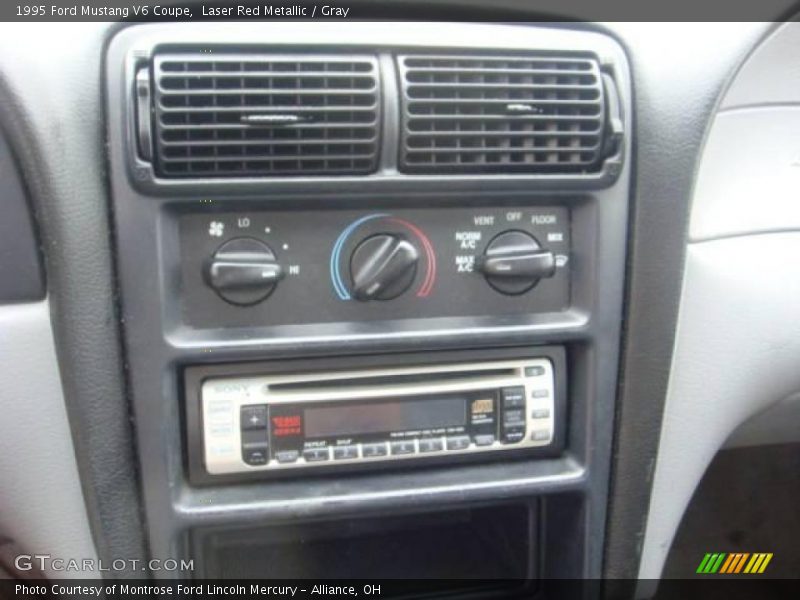 Laser Red Metallic / Gray 1995 Ford Mustang V6 Coupe