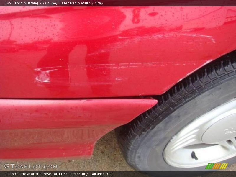 Laser Red Metallic / Gray 1995 Ford Mustang V6 Coupe
