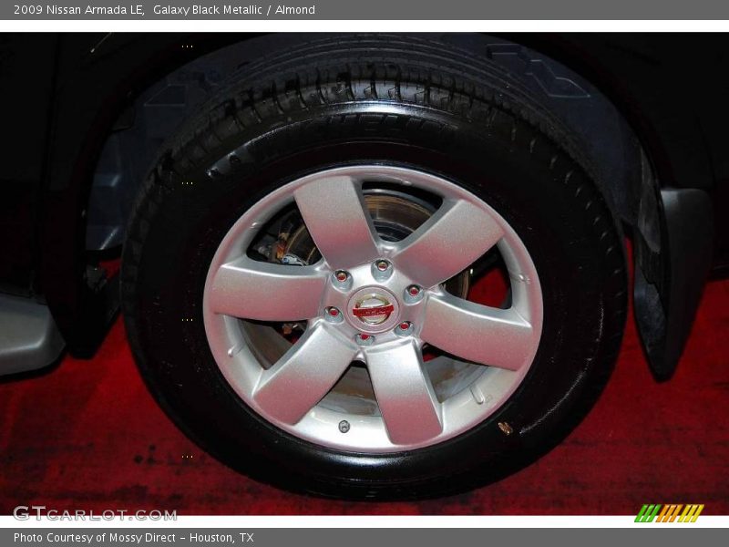 Galaxy Black Metallic / Almond 2009 Nissan Armada LE