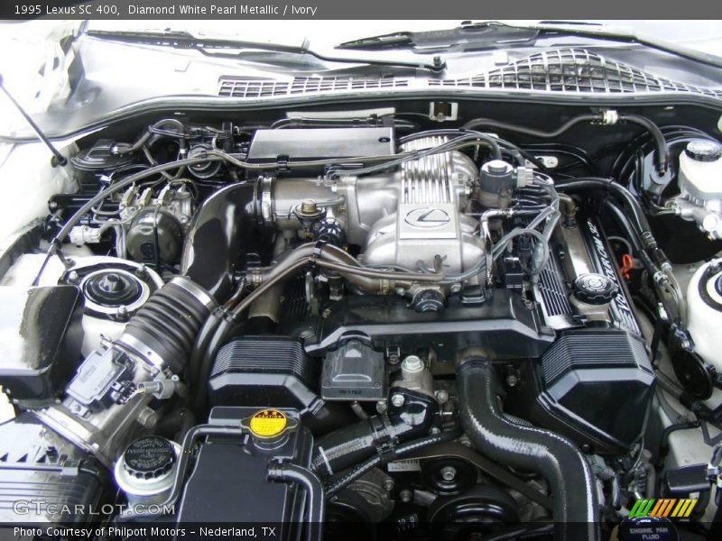Diamond White Pearl Metallic / Ivory 1995 Lexus SC 400