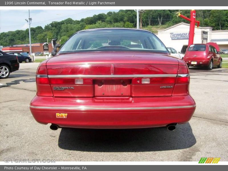Toreador Red Metallic / Light Parchment 1996 Lincoln Continental