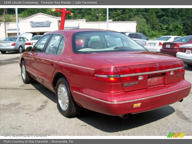Toreador Red Metallic / Light Parchment 1996 Lincoln Continental