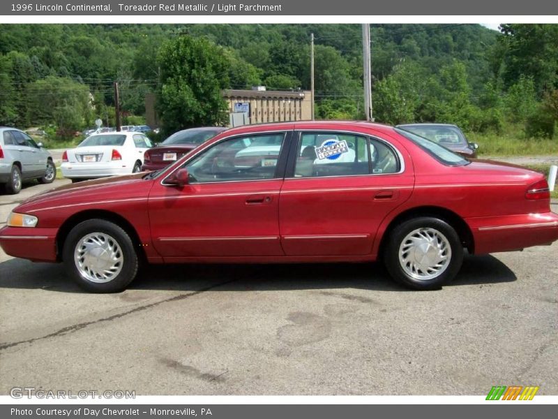 Toreador Red Metallic / Light Parchment 1996 Lincoln Continental