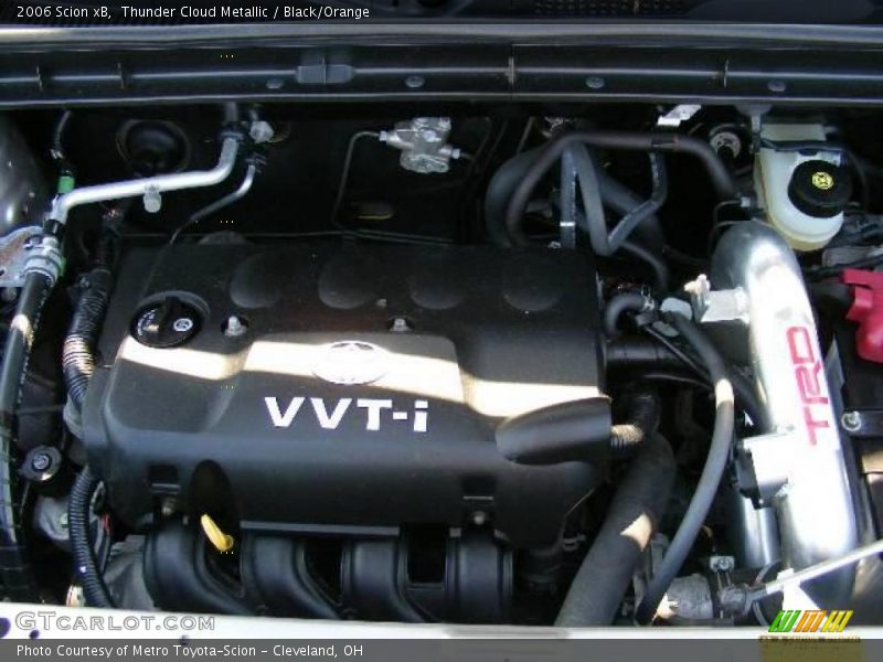 Thunder Cloud Metallic / Black/Orange 2006 Scion xB