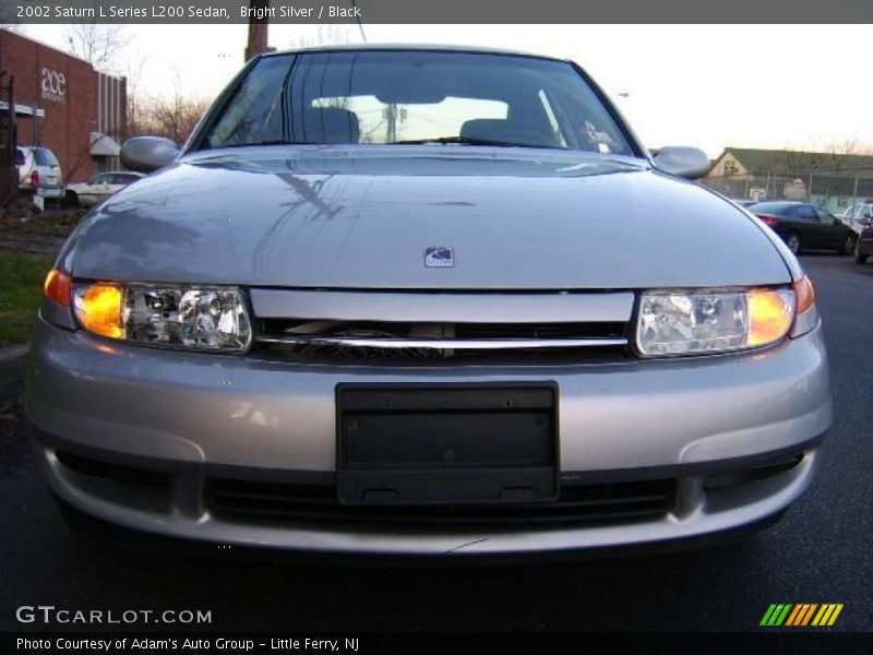 Bright Silver / Black 2002 Saturn L Series L200 Sedan