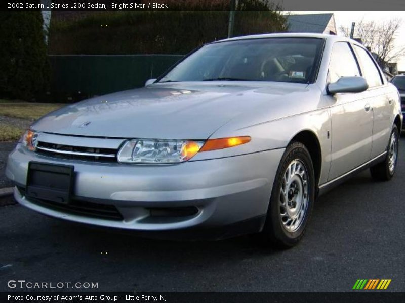 Bright Silver / Black 2002 Saturn L Series L200 Sedan