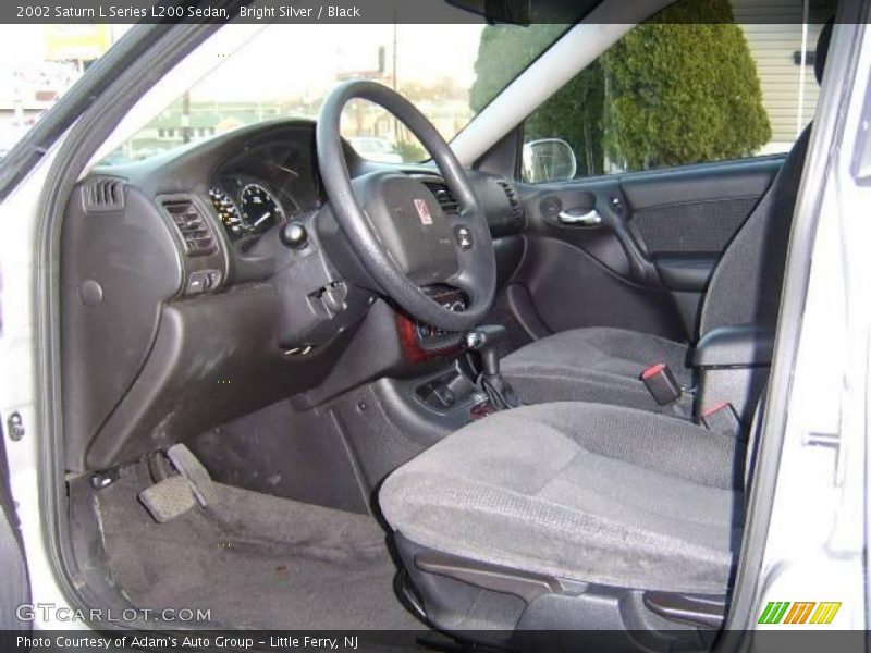 Bright Silver / Black 2002 Saturn L Series L200 Sedan