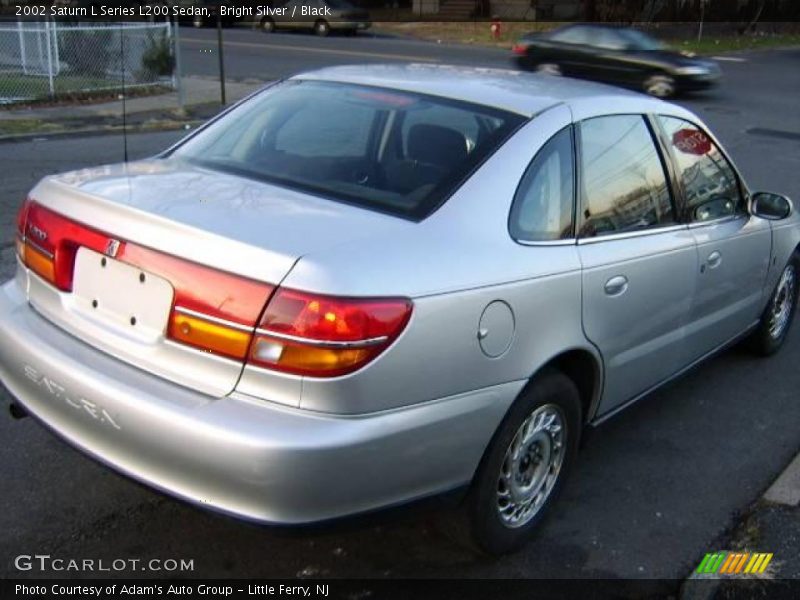 Bright Silver / Black 2002 Saturn L Series L200 Sedan